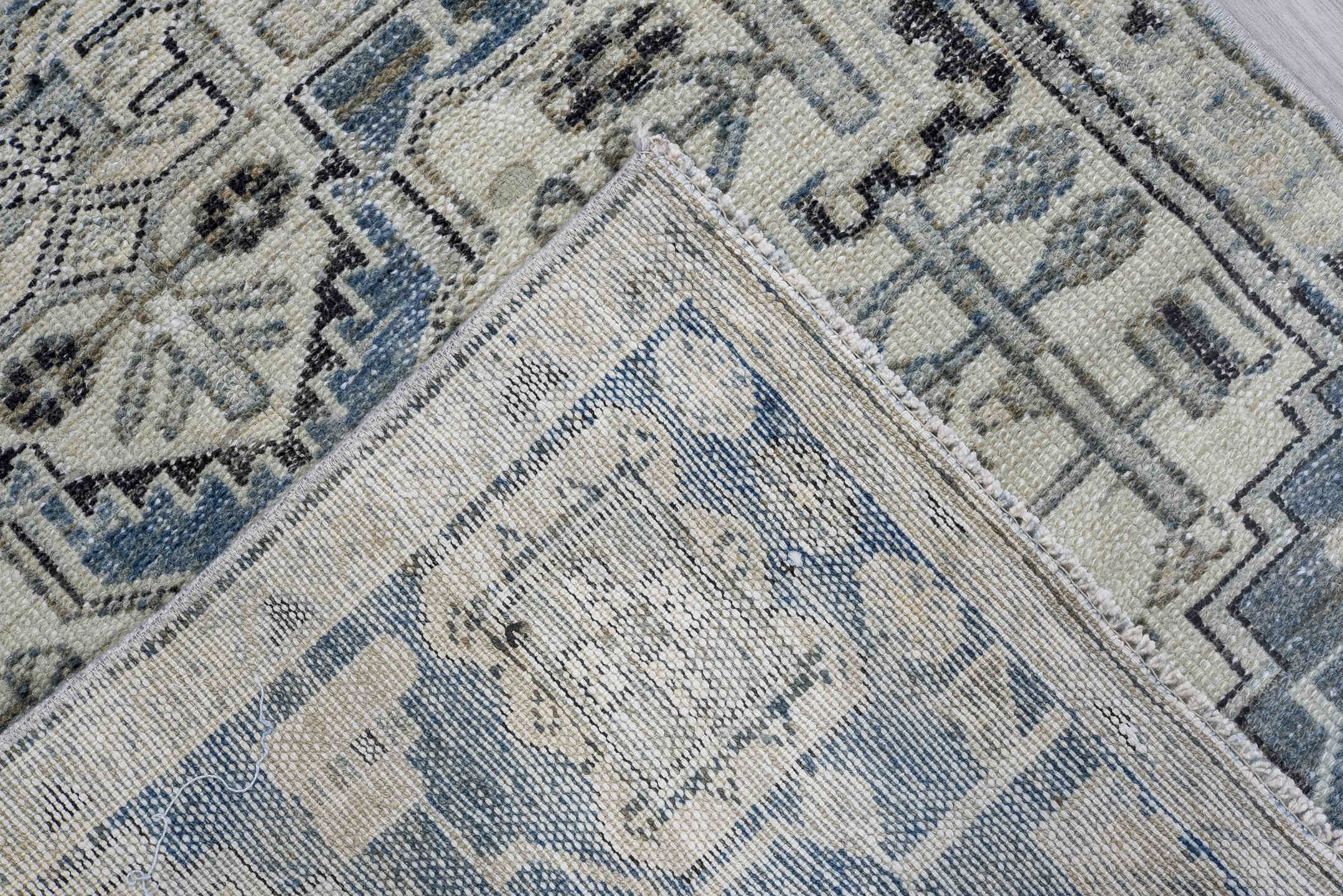 2' x 9' one-of-a-kind handmade vintage Karaje runner rug. Color palette: gray, light gray, off-white, black, blue, silver