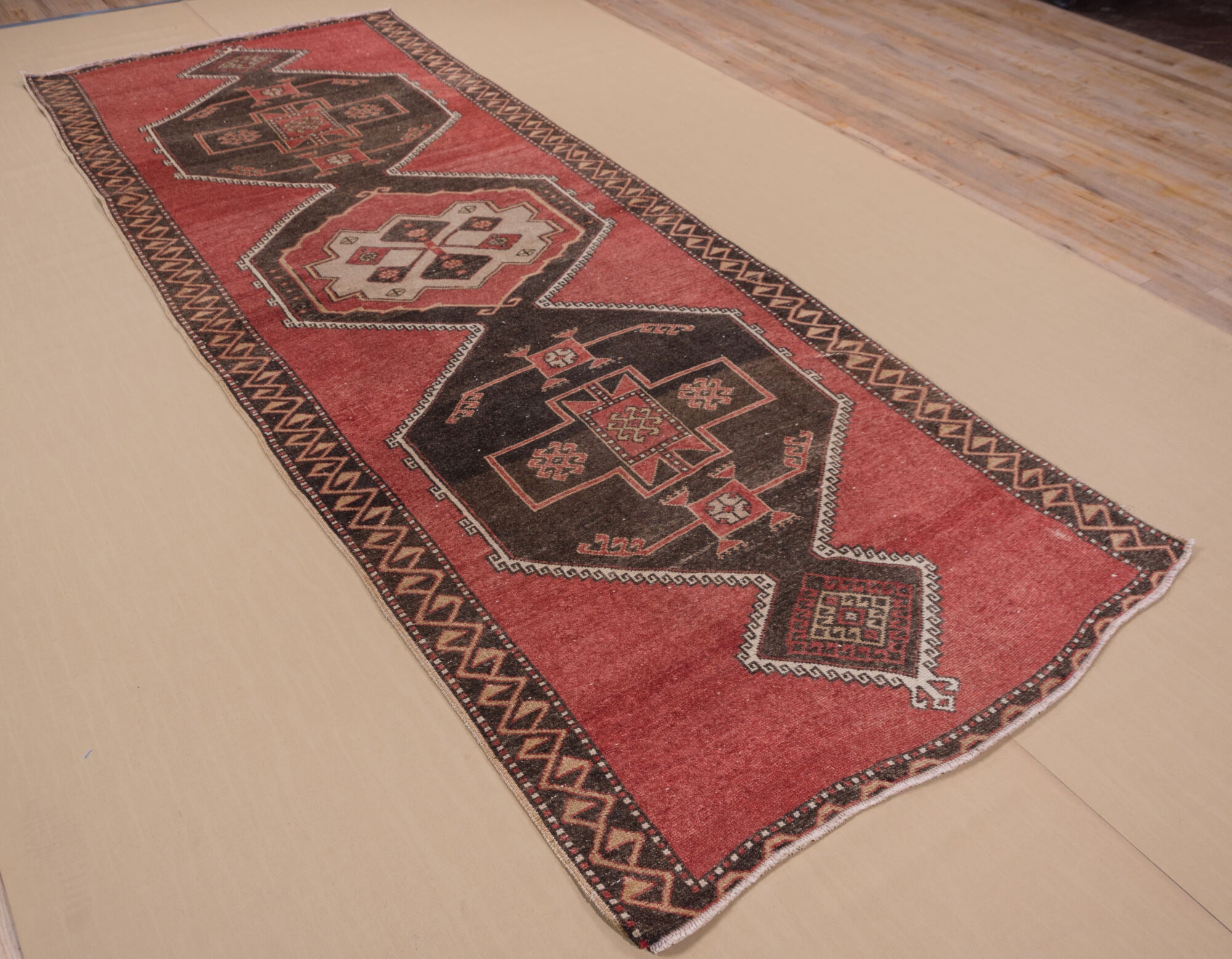4' x 11' one-of-a-kind handmade vintage Oushak runner rug. Color palette: brown, gray, indian red, light gray, off-white