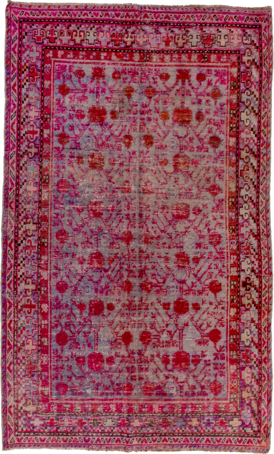 5' x 9' one-of-a-kind handmade vintage Khotan medium size rug. Color palette: brown, pink, red, rosy brown
