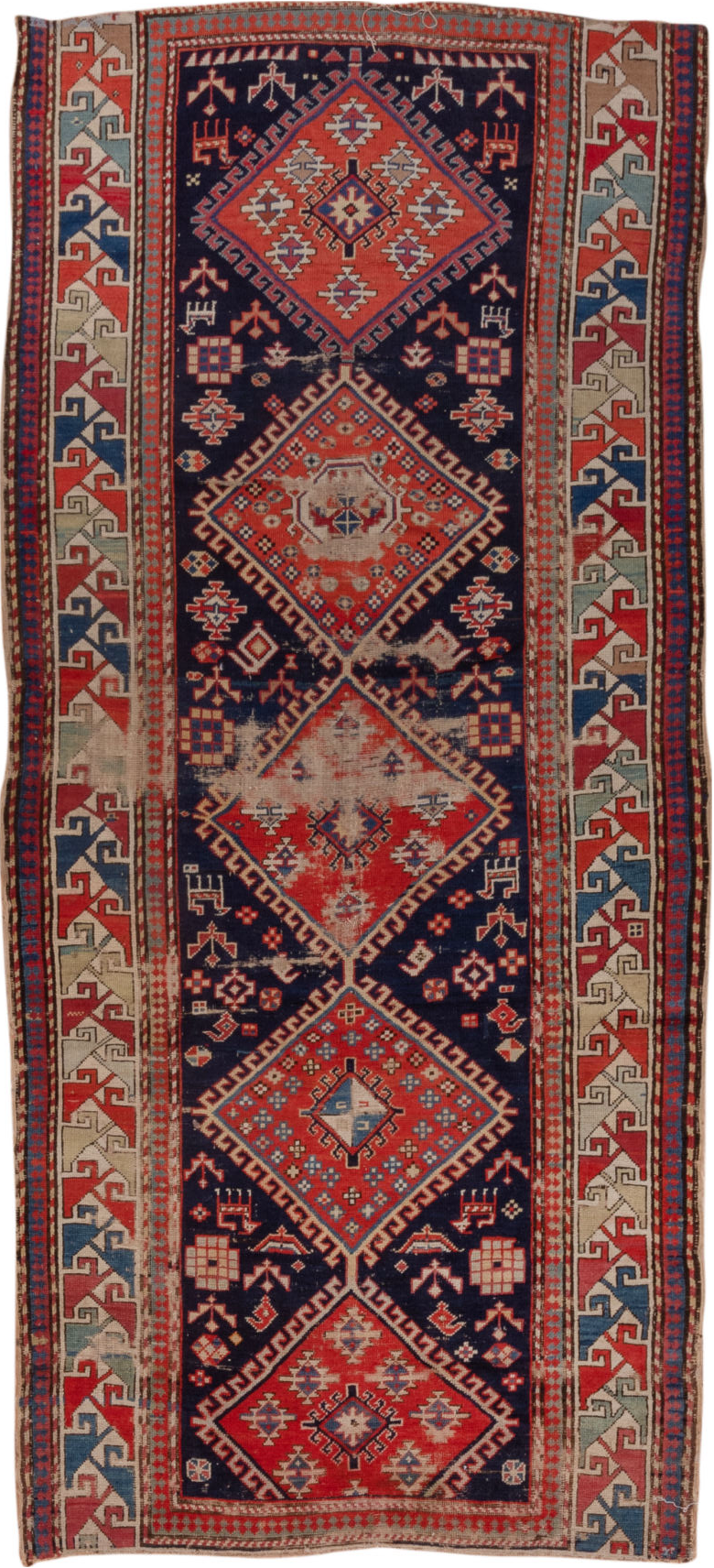 4' x 9' one-of-a-kind handmade vintage Shirvan runner rug. Color palette: blue, brown, gray, pink, red, redwood