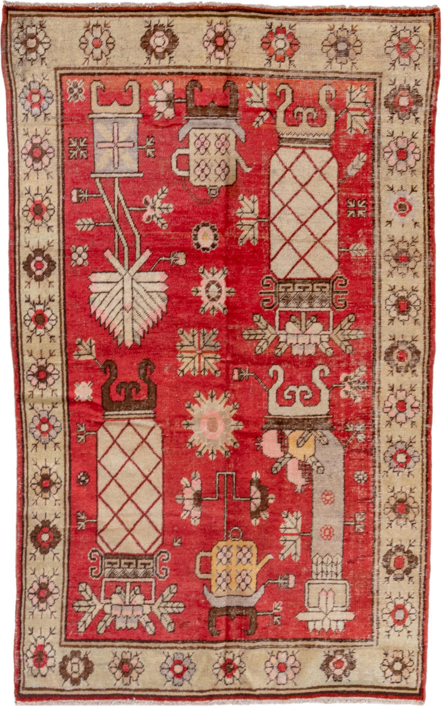 4' x 7' one-of-a-kind handmade vintage Khotan rug. Color palette: brown, fire brick, gray, indian red, light gray, off-white