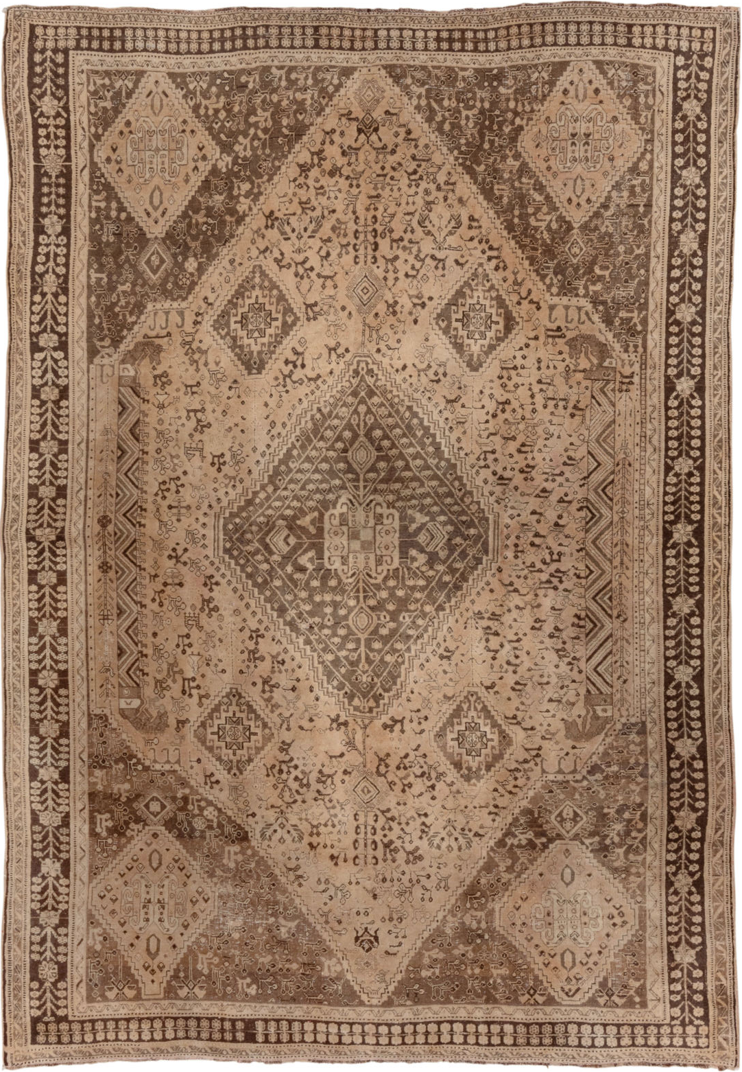 6' x 9' one-of-a-kind handmade vintage Shiraz medium size rug. Color palette: brown