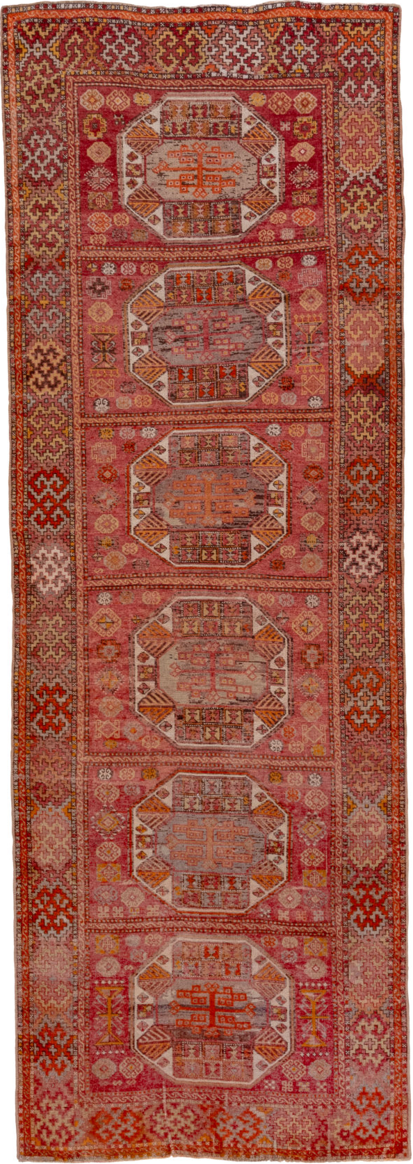 4' x 11' one-of-a-kind handmade vintage Oushak runner rug. Color palette: brown, maroon, pink, red, sienna