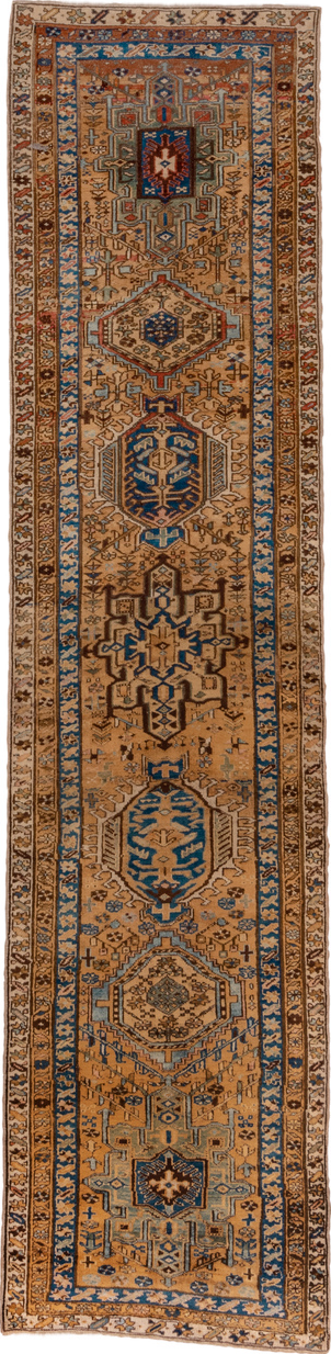 2' x 11' one-of-a-kind handmade vintage Heriz runner rug. Color palette: brown, gray, blue