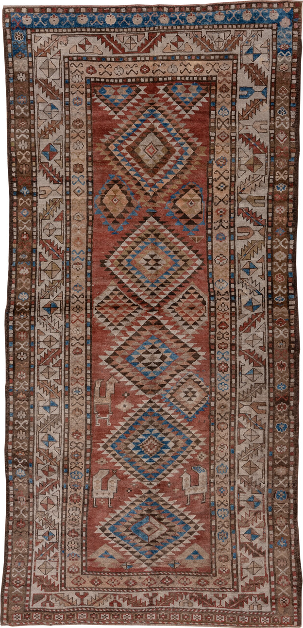 4' x 9' one-of-a-kind handmade vintage Kurd runner rug. Color palette: brown, gray, blue, pink, light gray, arapawa