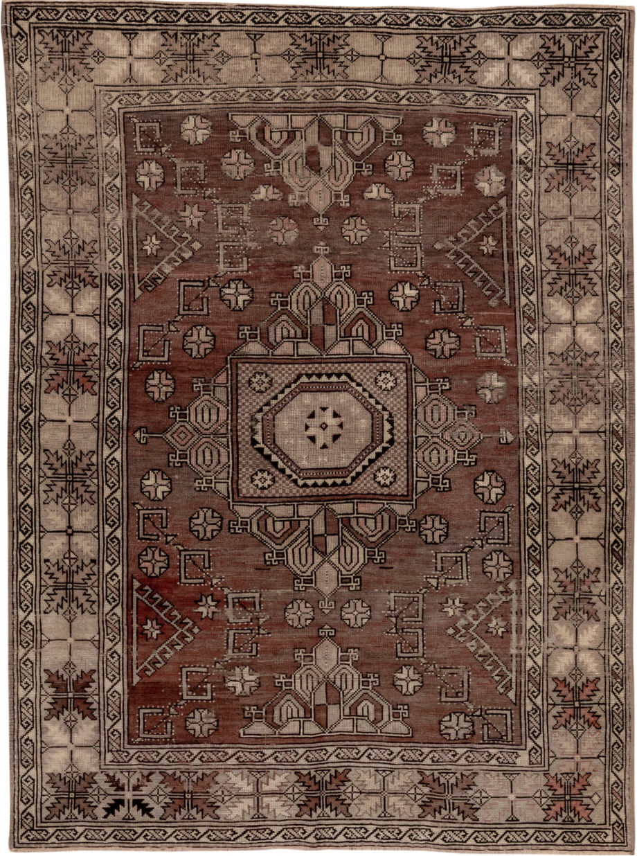 5' x 7' one-of-a-kind handmade vintage Oushak rug. Color palette: black, brown, gray, light gray, pink