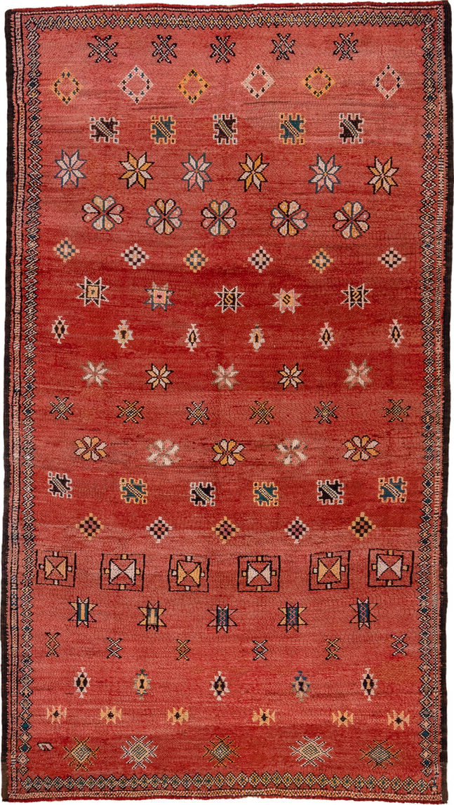 5' x 10' one-of-a-kind handmade vintage Moroccan medium size rug. Color palette: brown, red, pink, gray