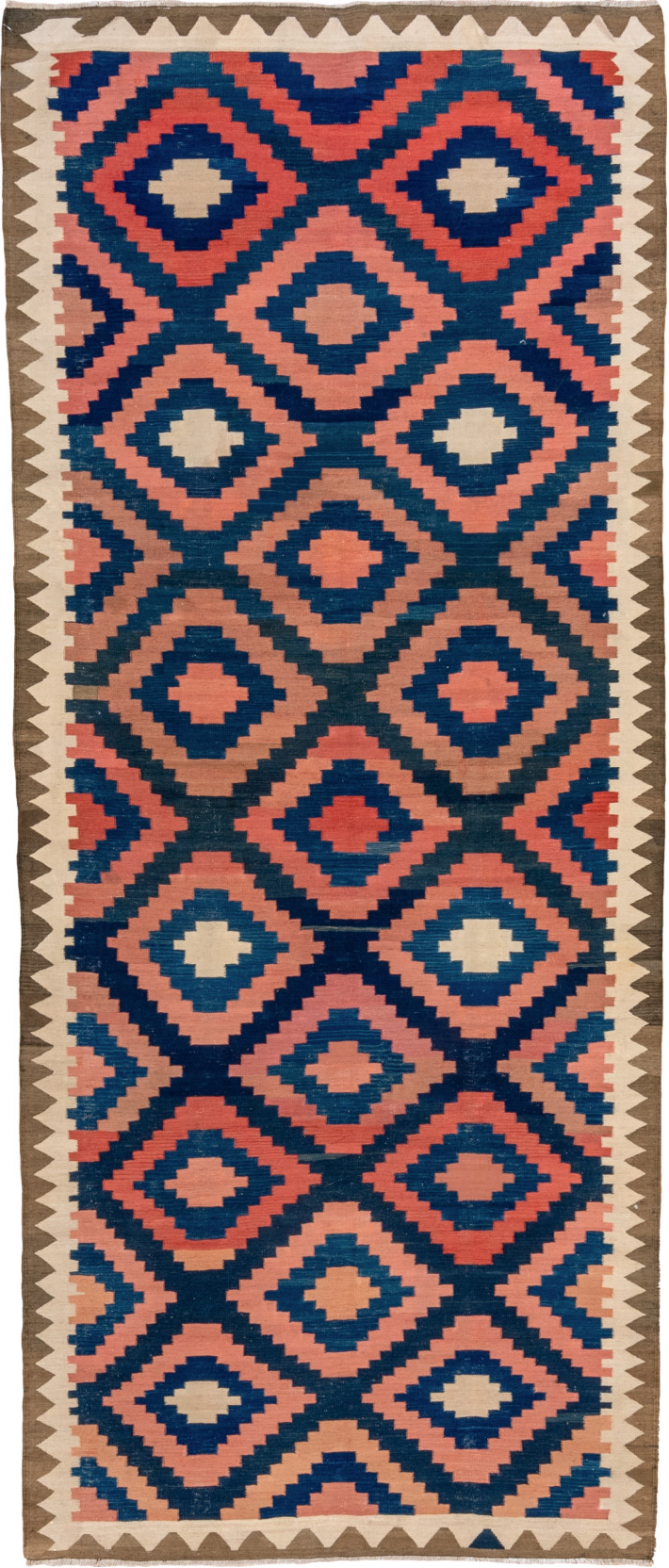 4' x 10' one-of-a-kind handmade vintage Kilim runner rug. Color palette: blue, brown, gray, off-white, orange, pink, red