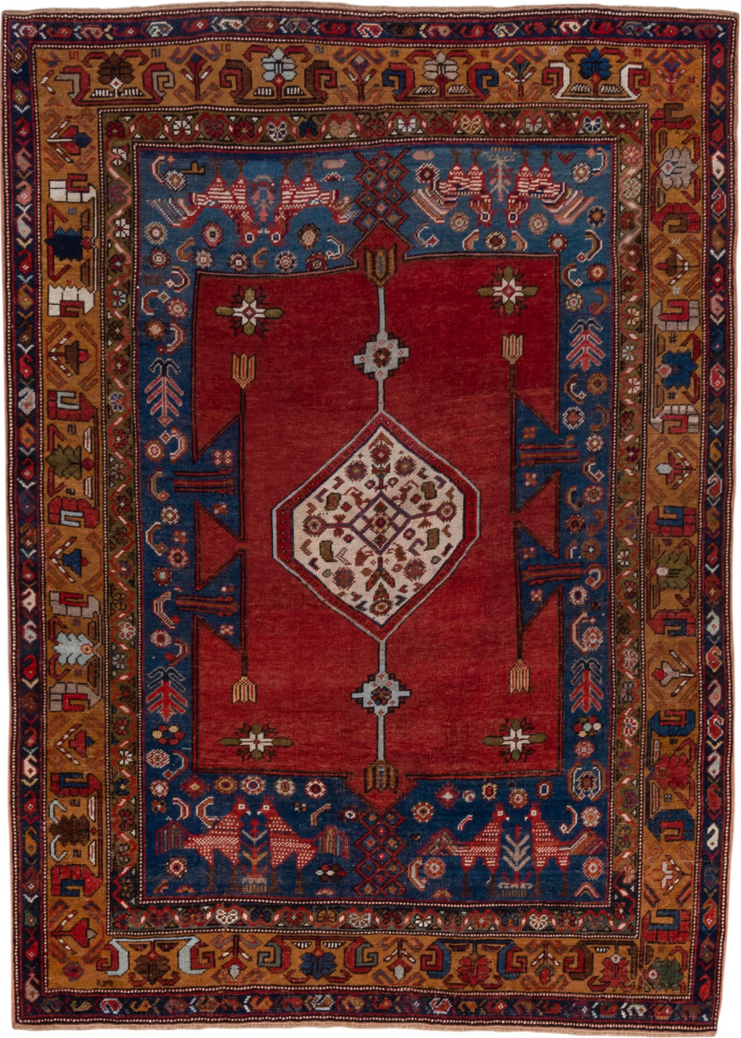 5' x 6' one-of-a-kind handmade vintage Caucasian rug. Color palette: blue, brown, gray, pink, red