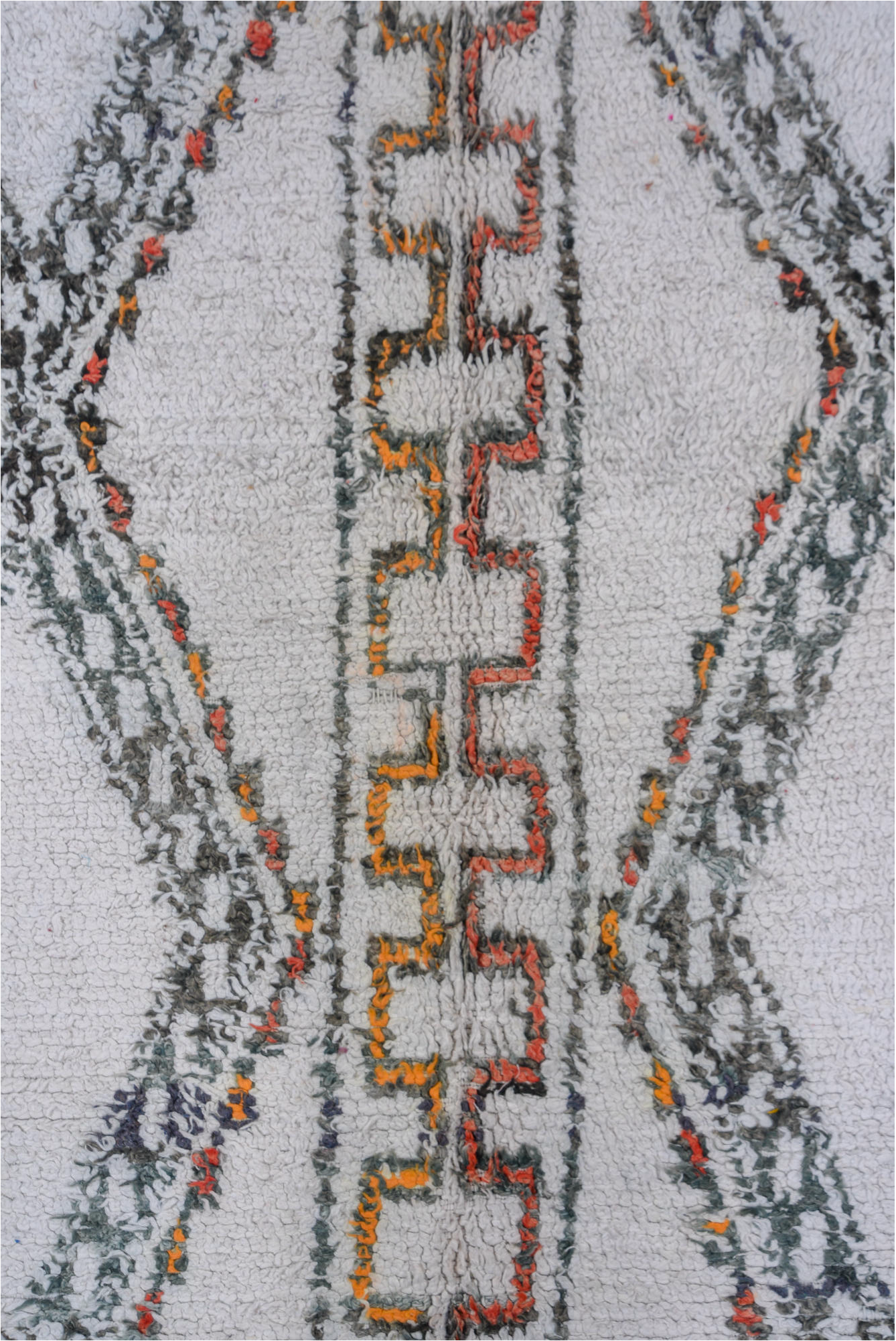 5' x 8' one-of-a-kind handmade vintage Moroccan medium size rug. Color palette: black, brown, charcoal, dark gray, dim gray