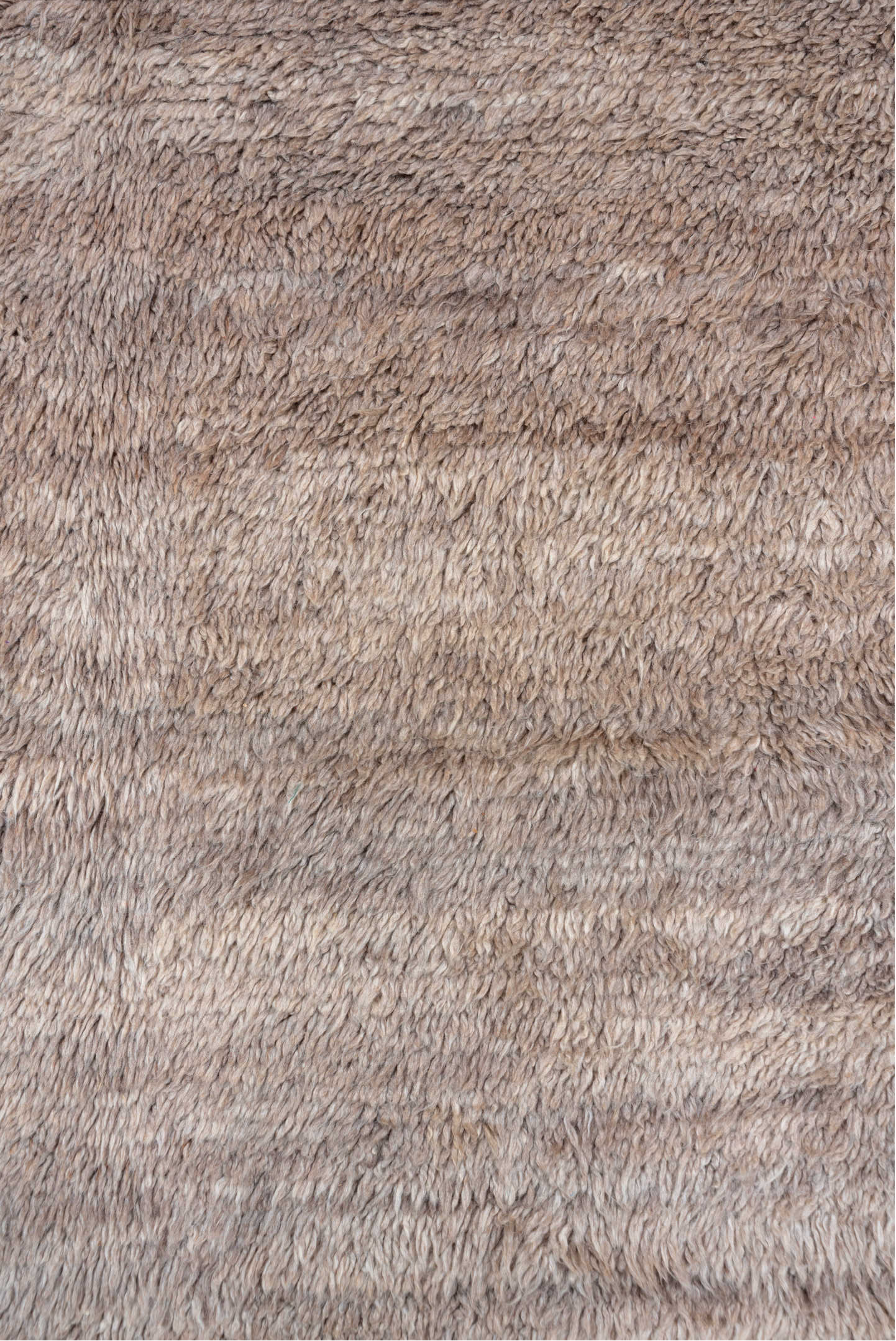 5' x 9' one-of-a-kind handmade vintage Moroccan medium size rug. Color palette: gray, pink, light gray, brown, off-white