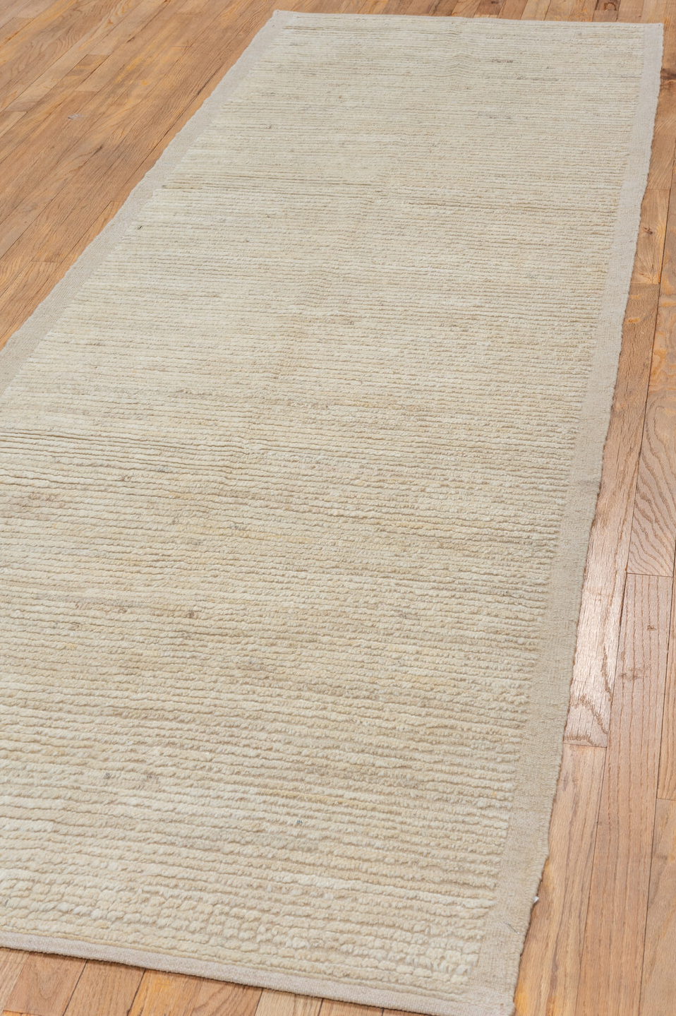 3' x 10' one-of-a-kind handmade vintage Tulu runner rug. Color palette: off-white, light gray, gray, brown, pink, white