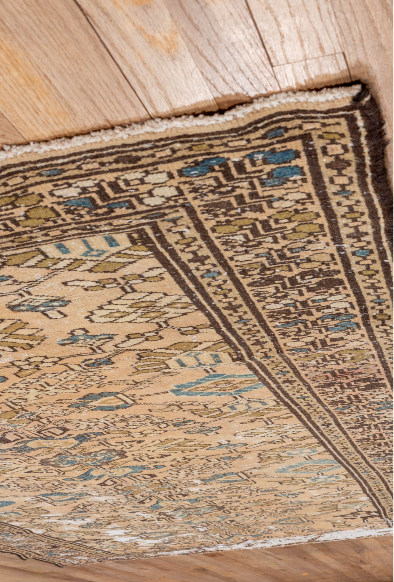 5' x 9' one-of-a-kind handmade vintage Distressed medium size rug. Color palette: brown, gray, light gray, off-white