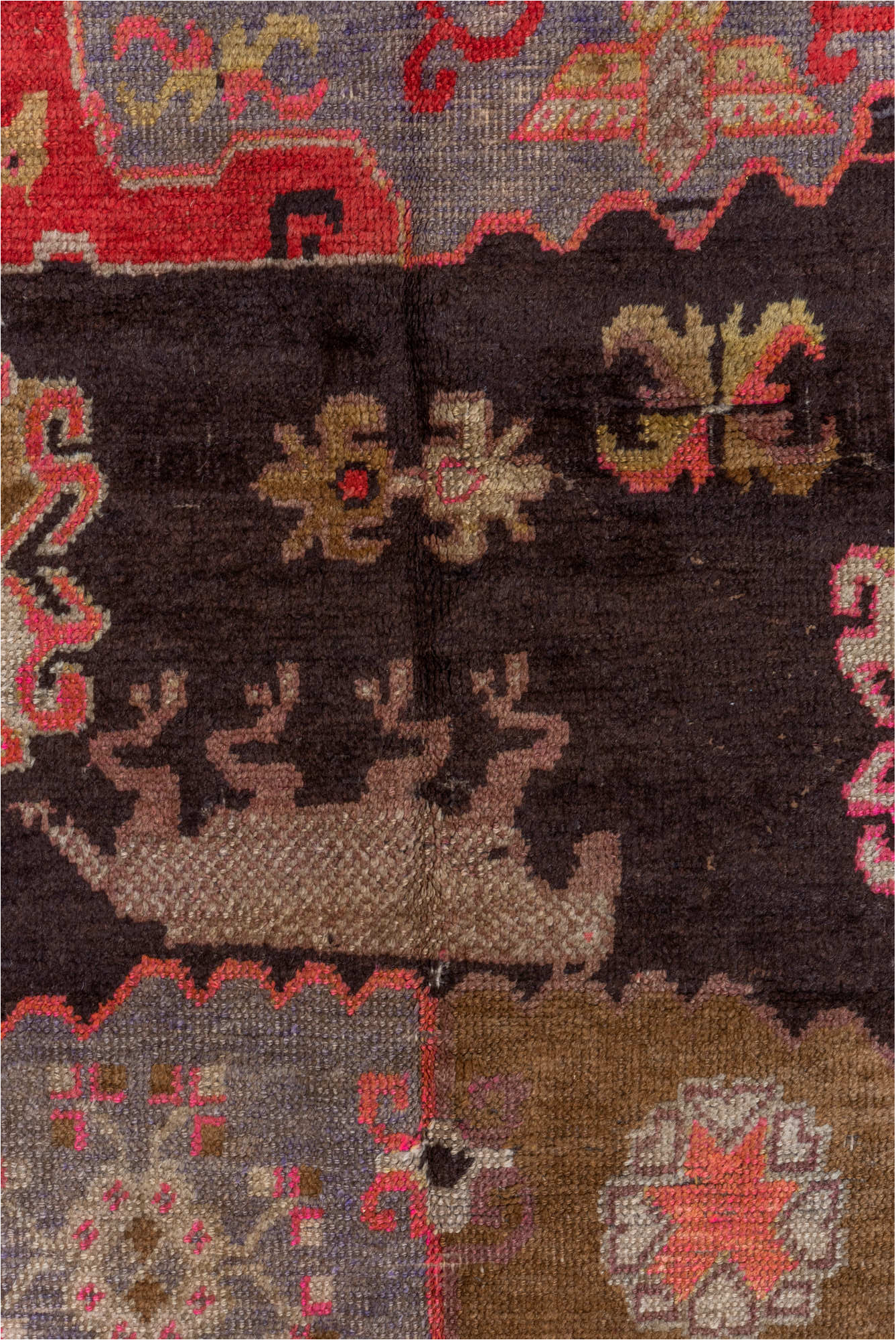 5' x 8' one-of-a-kind handmade vintage Khotan medium size rug. Color palette: black, brown, gray, pink, red