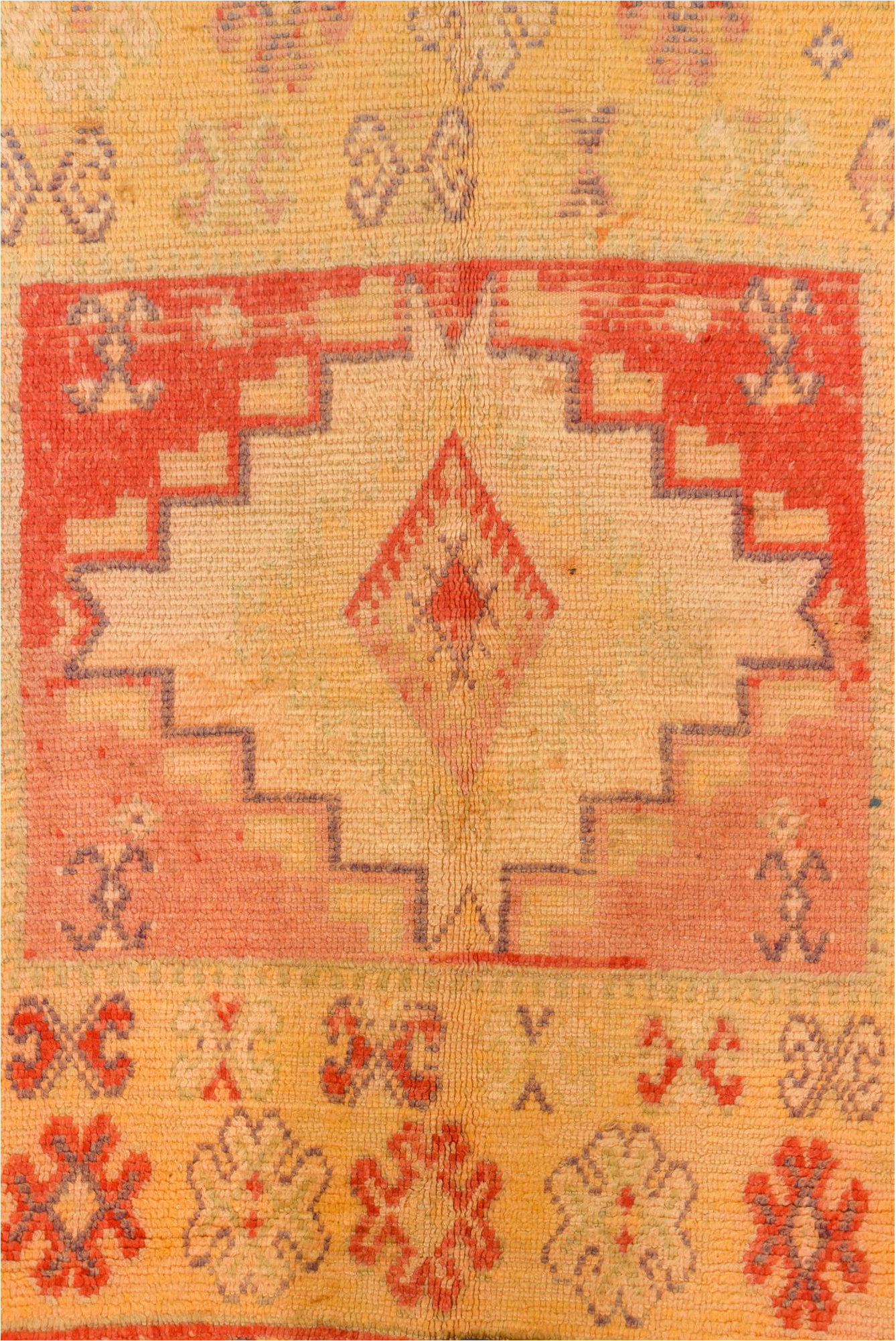 5' x 9' one-of-a-kind handmade vintage Moroccan medium size rug. Color palette: brown, off-white, orange, pink, red