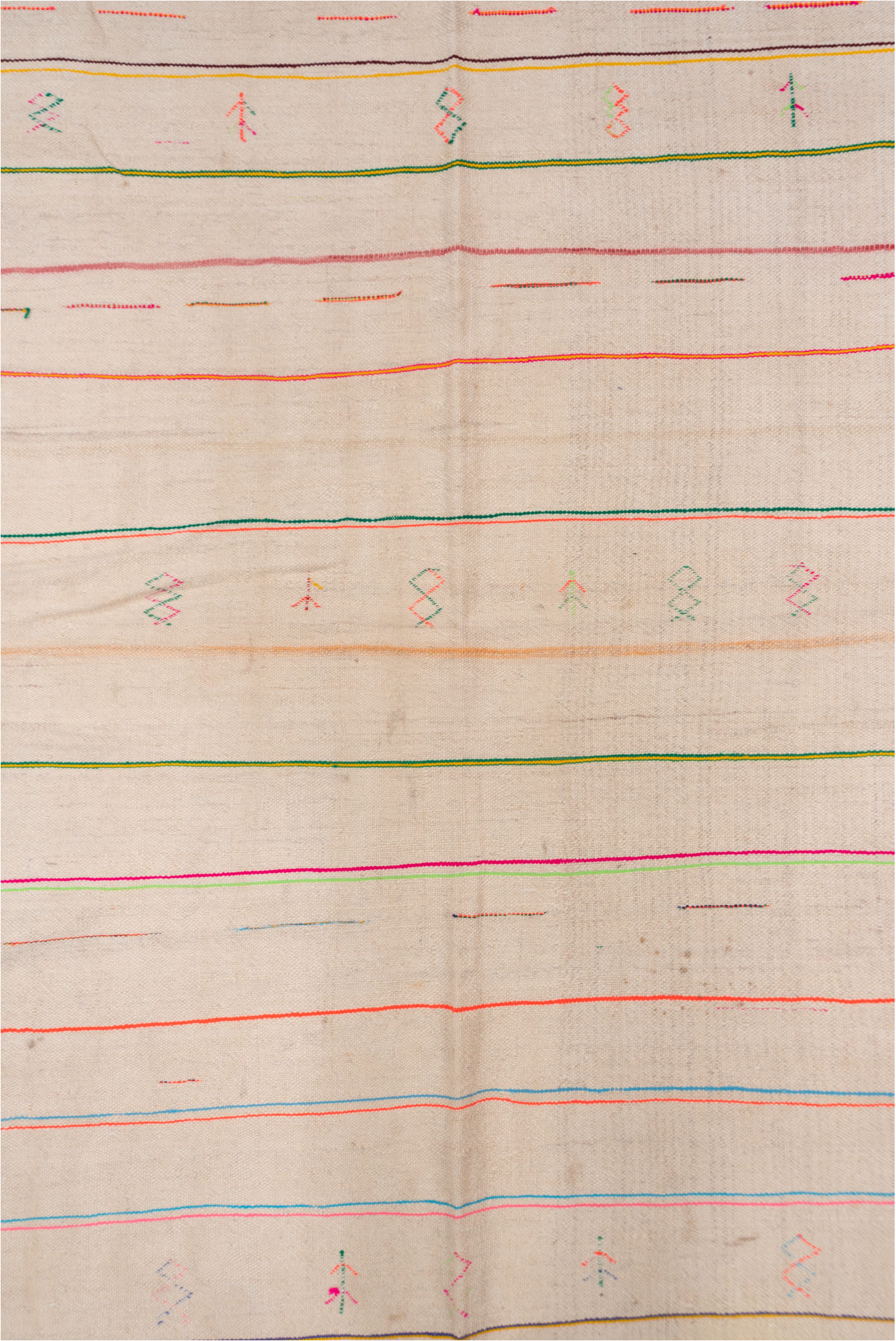 4' x 10' one-of-a-kind handmade vintage Textile runner rug. Color palette: brown, dark gray, gray, light gray, off-white