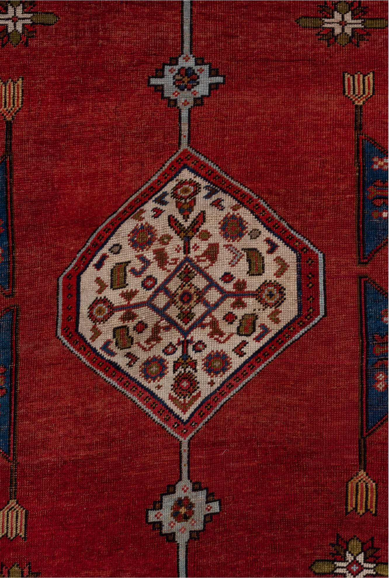 5' x 6' one-of-a-kind handmade vintage Caucasian rug. Color palette: blue, brown, gray, pink, red