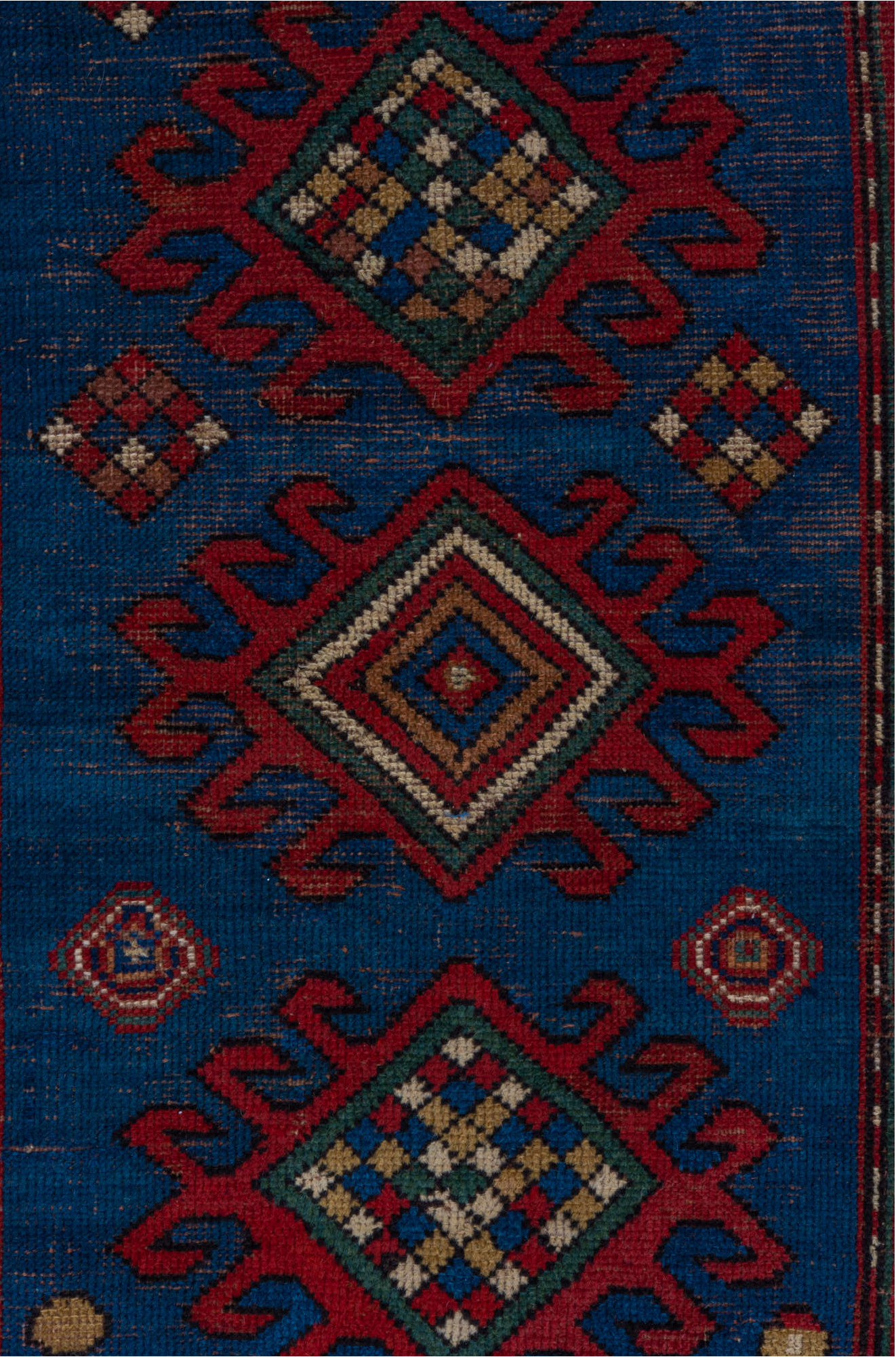 3' x 6' one-of-a-kind handmade vintage Kazak small size rug. Color palette: blue, brown, gray, pink, red