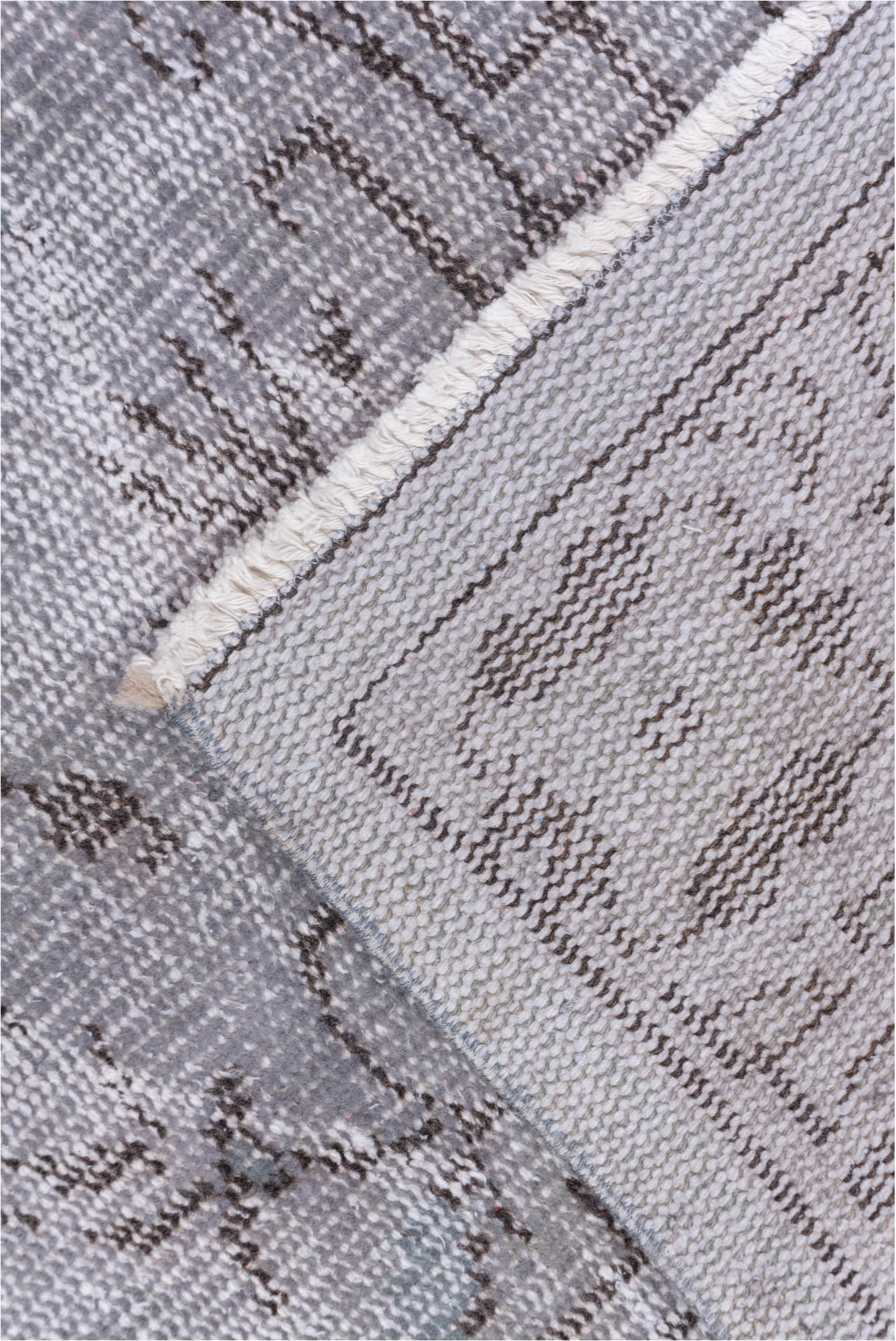 5' x 9' one-of-a-kind handmade vintage Overdyed medium size rug. Color palette: gray, light gray, off-white, light blue