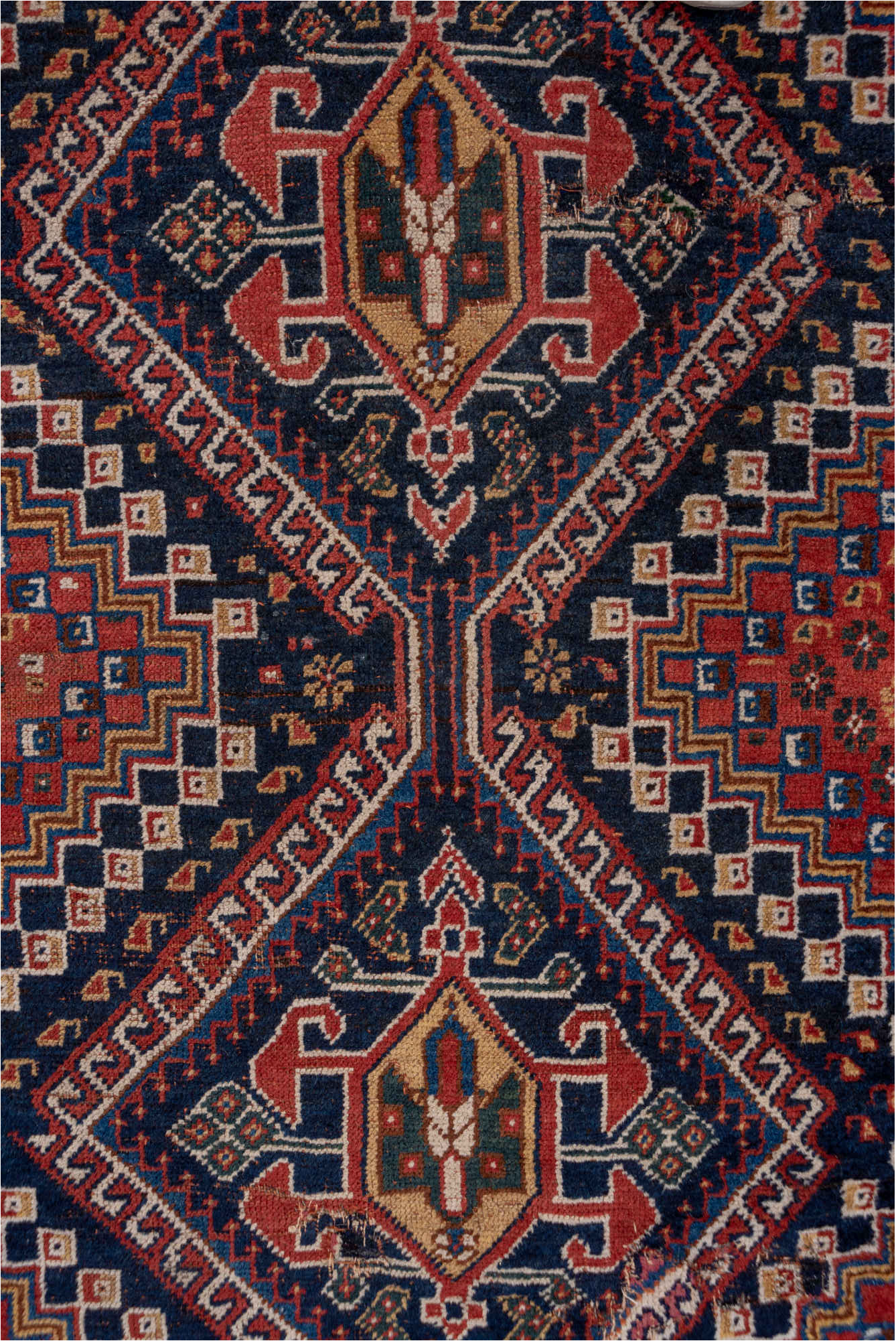 3' x 9' one-of-a-kind handmade vintage Shiraz runner rug. Color palette: black, blue, brown, fiord, gray, pink, red