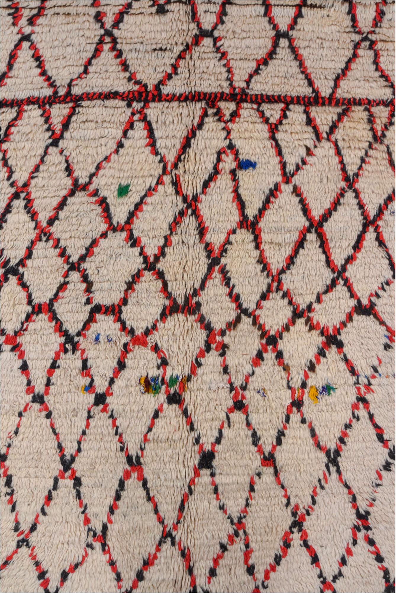 5' x 11' one-of-a-kind handmade vintage Moroccan rug. Color palette: brown, gray, light gray, off-white, pink, red, redwood