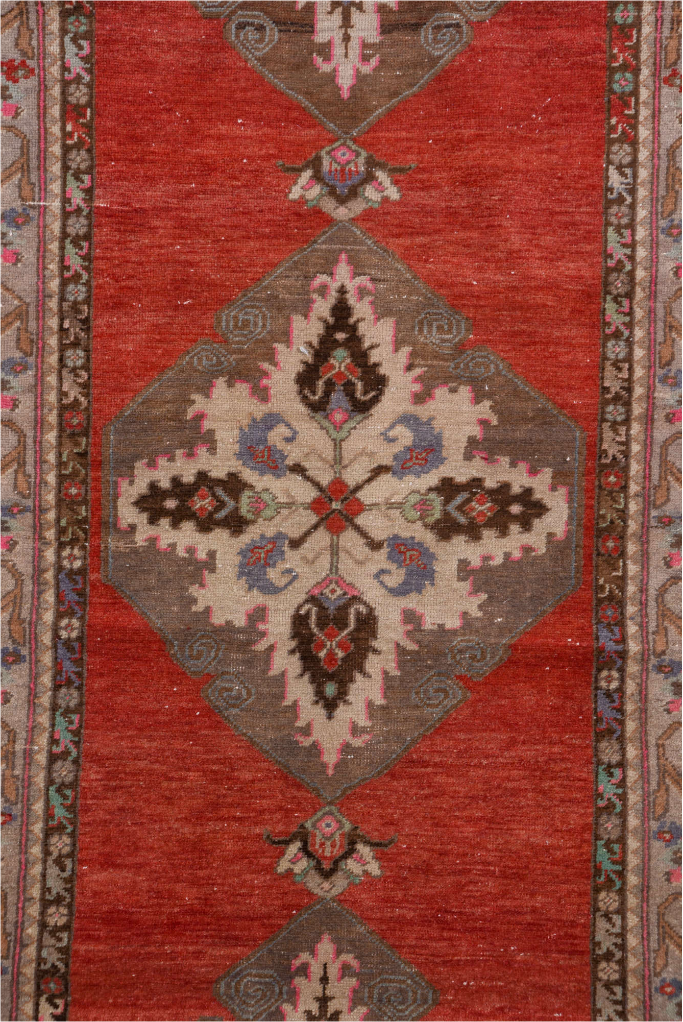 2' x 10' one-of-a-kind handmade vintage Oushak runner rug. Color palette: brown, gray, indian red, pink, red, redwood