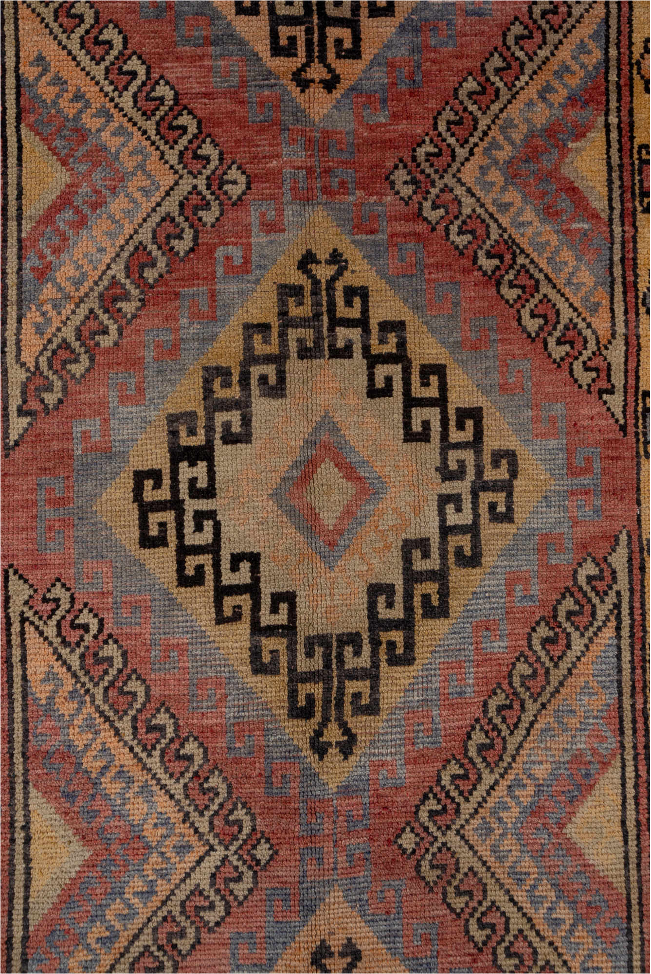 4' x 10' one-of-a-kind handmade vintage Oushak runner rug. Color palette: black, brown, gray, red