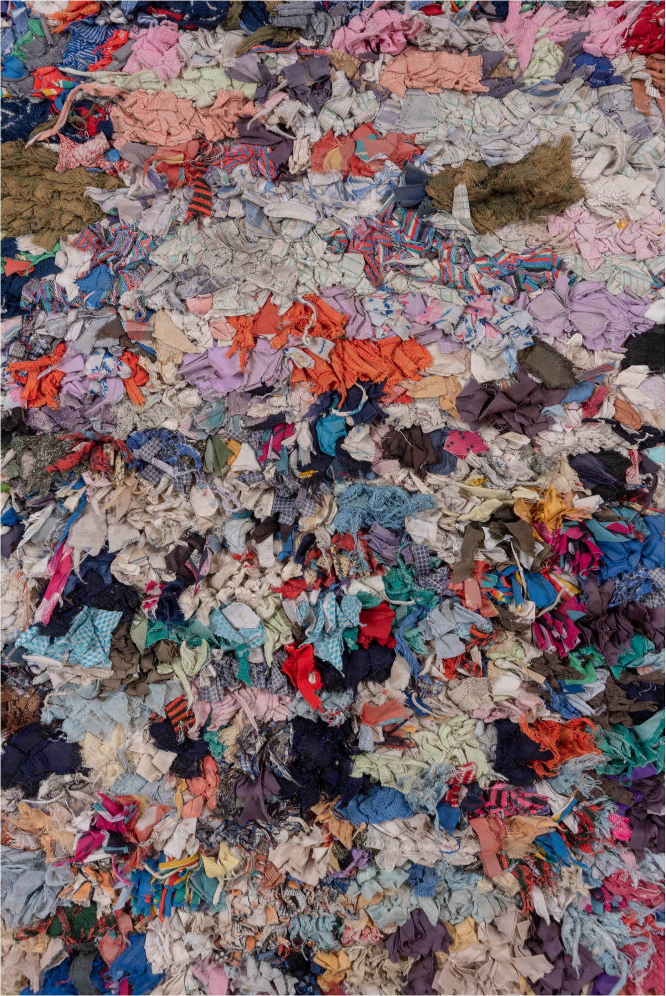 4' x 7' one-of-a-kind handmade vintage Rag Rug rug. Color palette: blue, brown, dark gray, gray, green, light gray