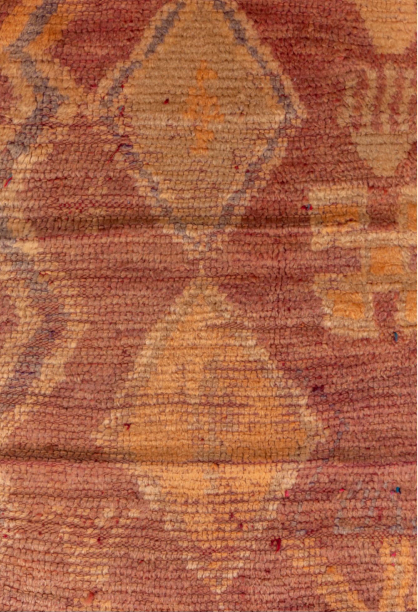 2' x 7' one-of-a-kind handmade vintage Moroccan runner rug. Color palette: brown, orange, pink, red