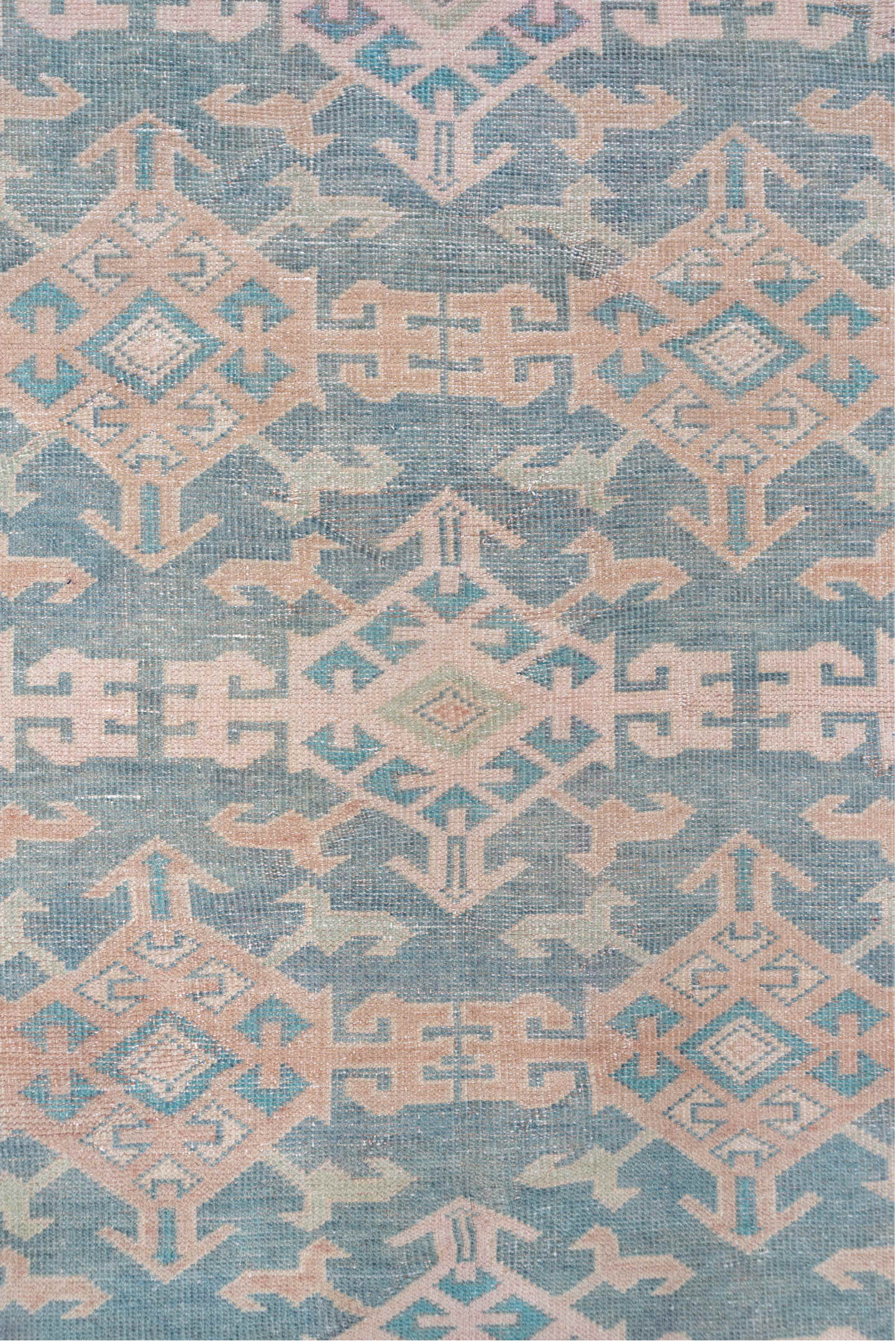 4' x 11' one-of-a-kind handmade vintage Oushak runner rug. Color palette: gray, pink, off-white, light gray, dark gray