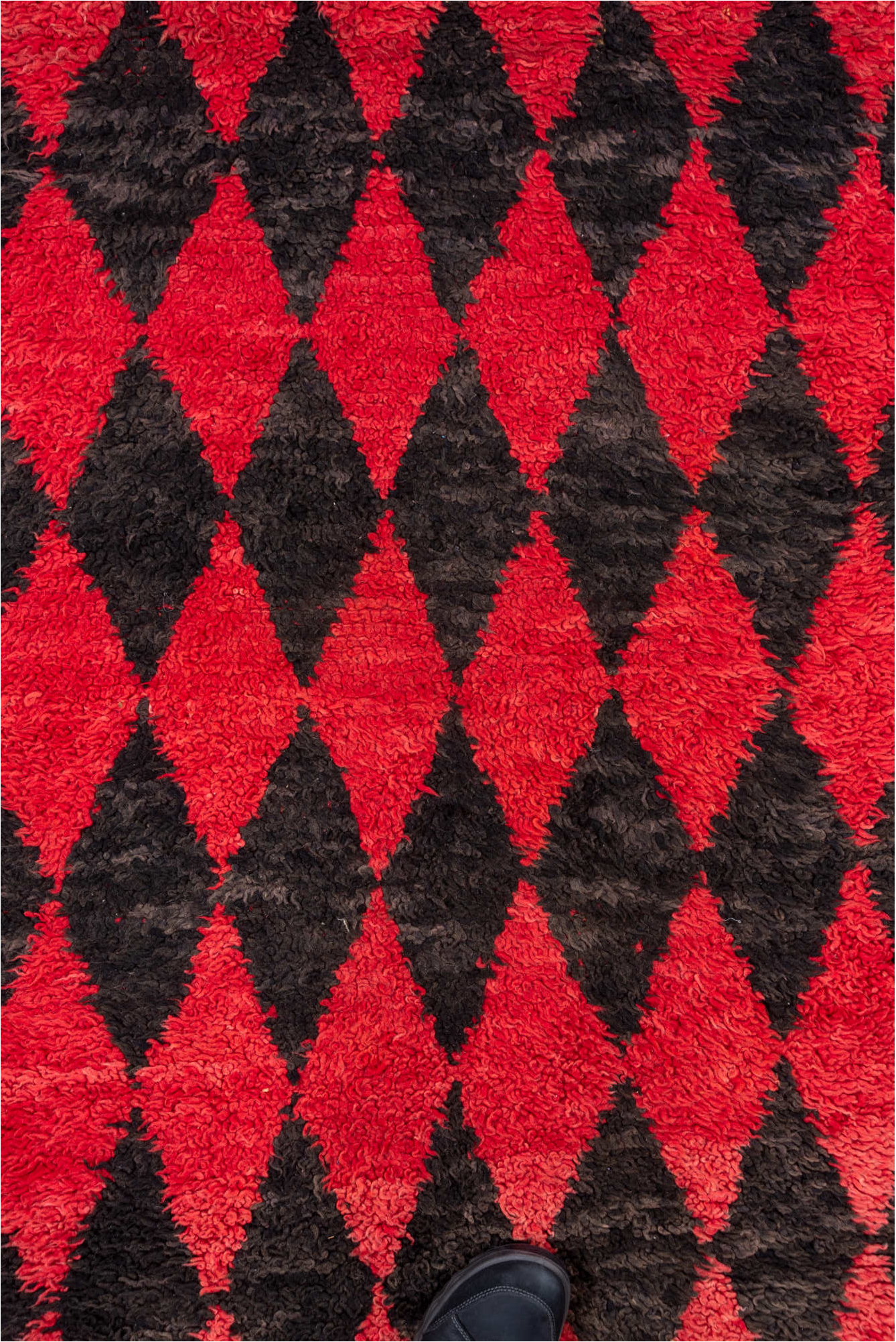 3' x 11' one-of-a-kind handmade vintage Moroccan runner rug. Color palette: black, brown, gray, indian red, pink, red
