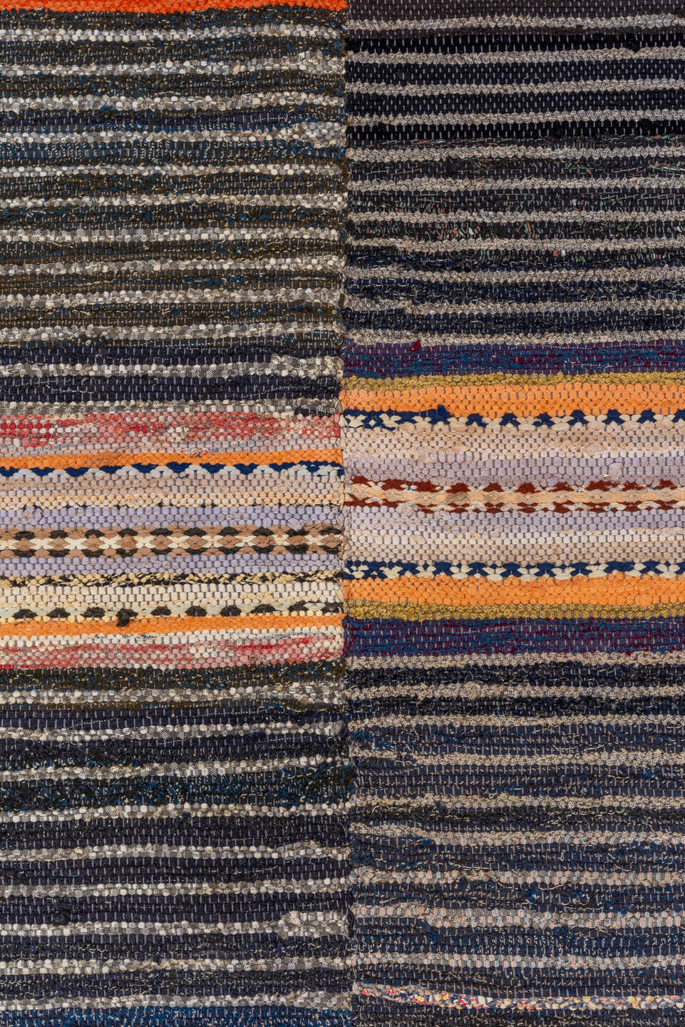 4' x 7' one-of-a-kind handmade vintage Rag Rug rug. Color palette: pink, brown, gray, light gray, orange, off-white, black