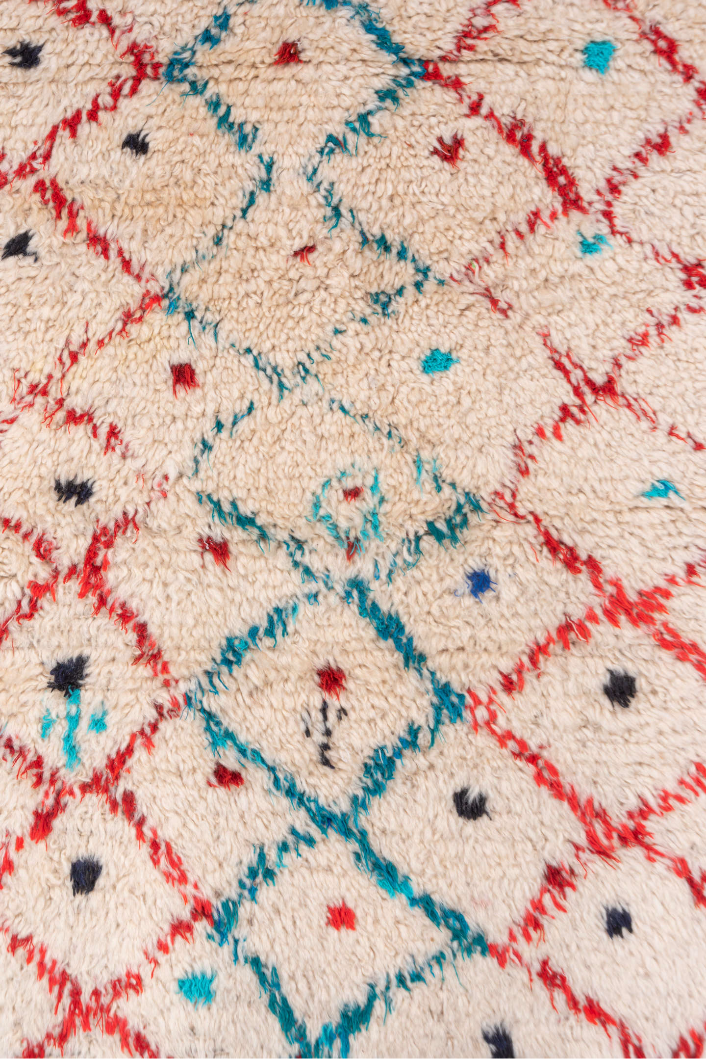 4' x 6' one-of-a-kind handmade vintage Moroccan small size rug. Color palette: red, pink, gray, black, blue, green