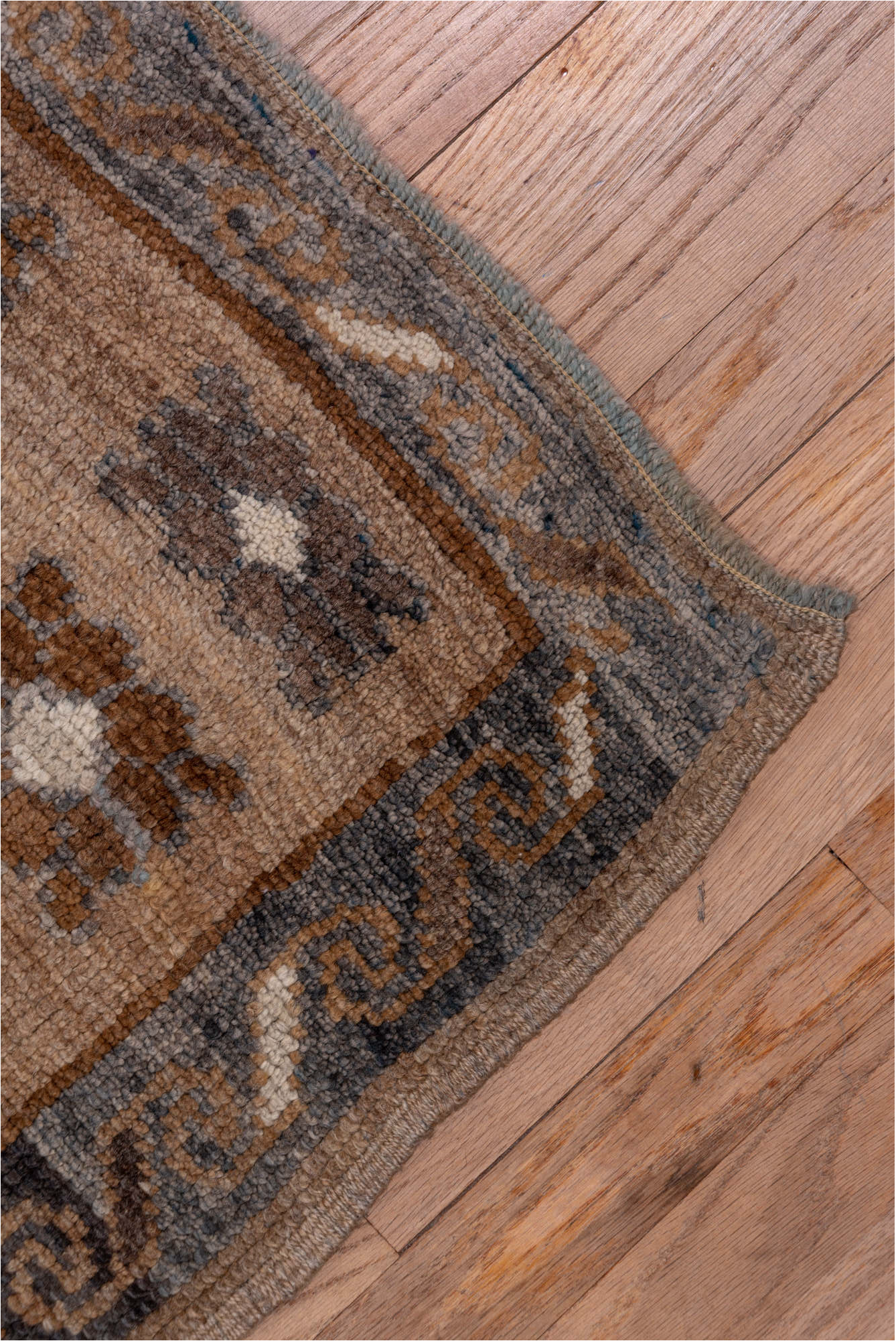 7' x 11' one-of-a-kind handmade vintage Kars large size rug. Color palette: black, brown, gray, light gray, off-white, pink