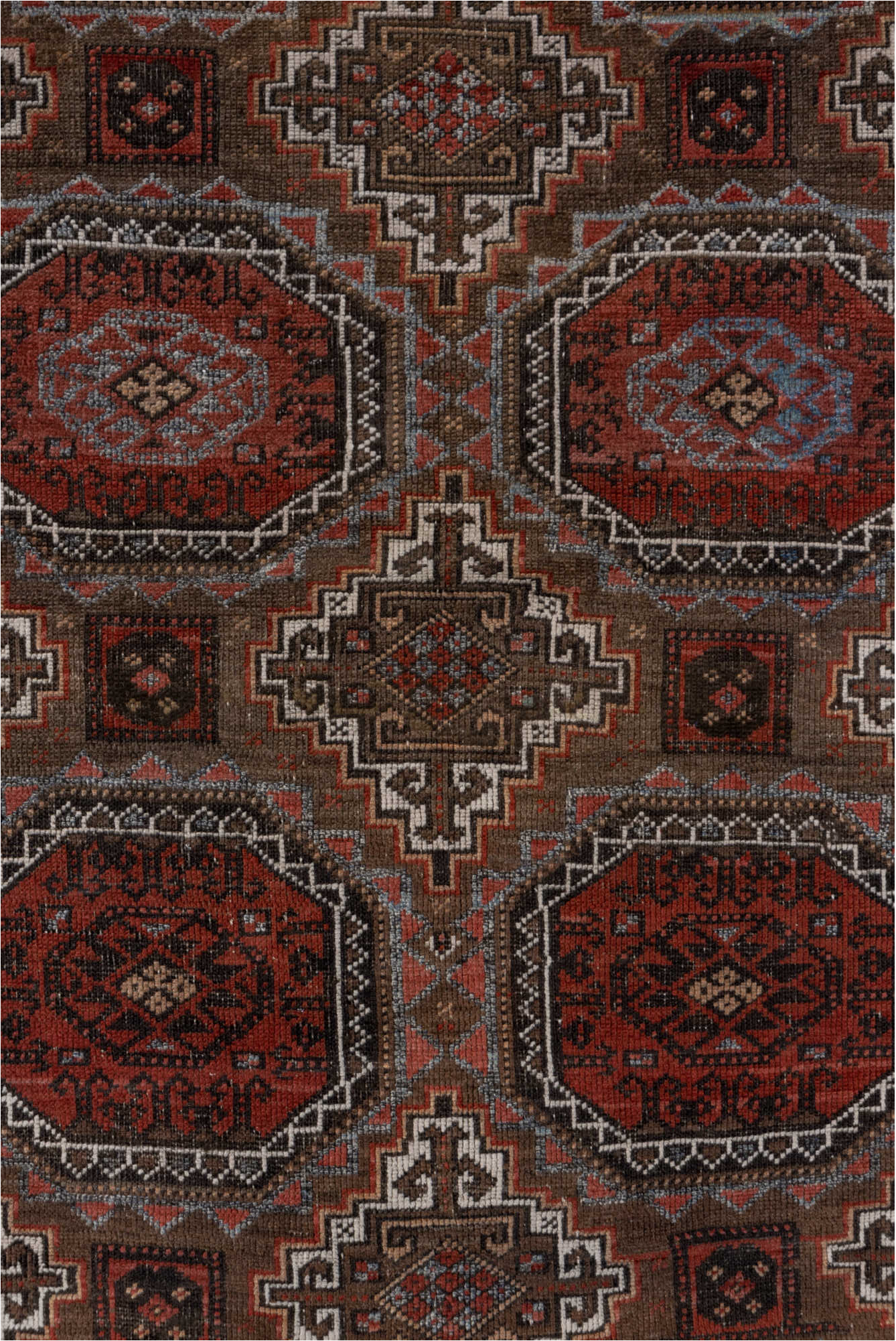 3' x 6' one-of-a-kind handmade vintage Belouch small size rug. Color palette: brown, gray, pink, red, redwood